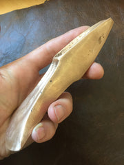Large Bronze Age axe head replica. Life size.