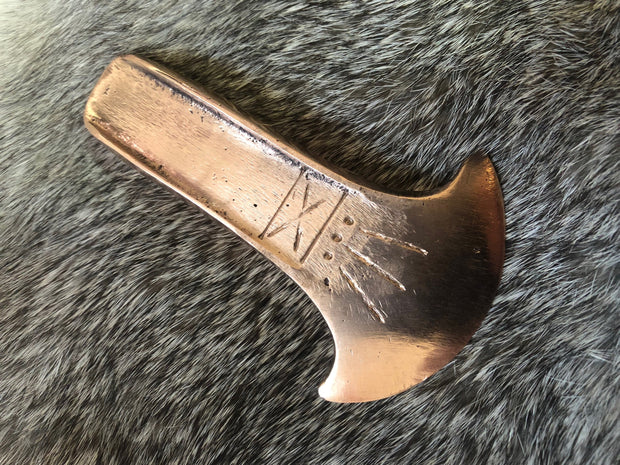 Early Bronze Age flanged axe head replica. Life size.